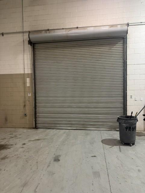 Grade-level rolling overhead door inside the warehouse